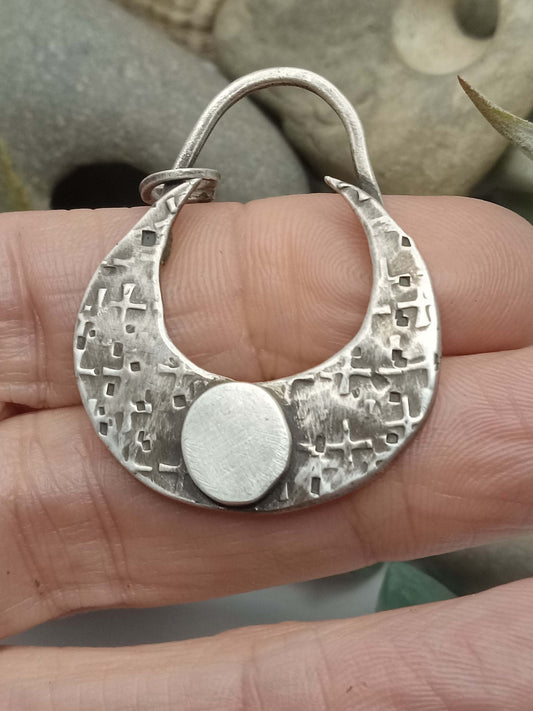 Silver Crescent Moon Pendant in hand